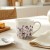 pol_pl_Kubek-porcelanowy-kwiaty-LOUKA-430-ml-18477_2.jpg
